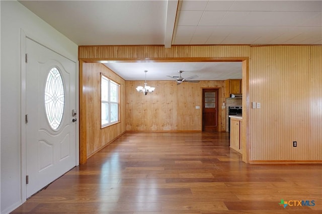 1001 US Highway 77 N, Hallettsville, TX 77964 - foyer with wood finished floors, a chandelier, wood walls, baseboards, and ceiling fan