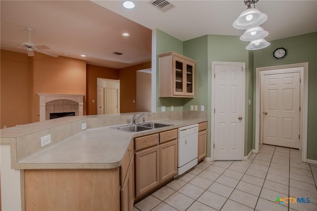 106 Fieldstone, Victoria, TX 77901 - kitchen with dishwasher, ceiling fan, light tile patterned flooring, a peninsula, and light countertops