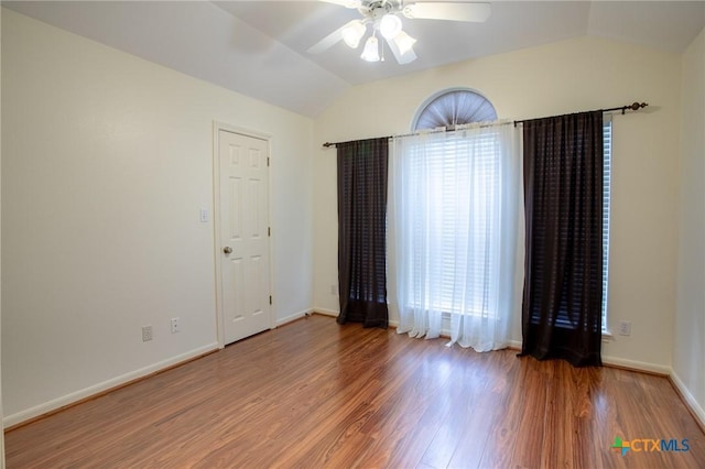 106 Fieldstone, Victoria, TX 77901 - unfurnished room featuring vaulted ceiling, wood finished floors, and ceiling fan