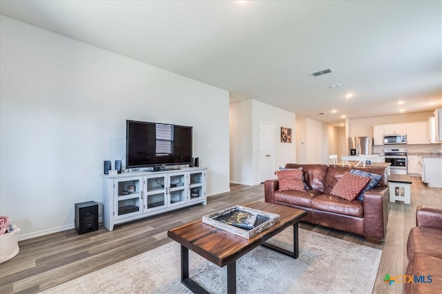 living room featuring hardwood / wood-style floors