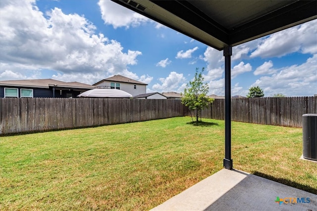 view of yard featuring central AC unit