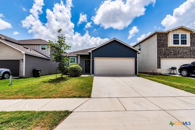 view of front facade featuring a garage and a front lawn