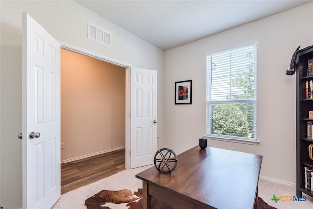 office space featuring dark hardwood / wood-style floors