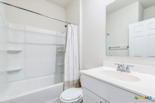 full bathroom featuring vanity, toilet, and shower / bath combination with curtain