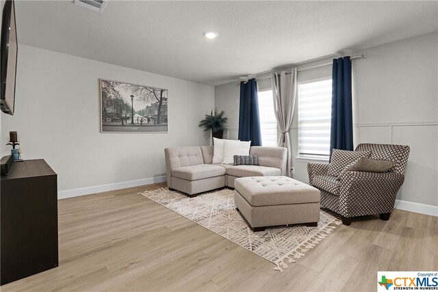 living room featuring light hardwood / wood-style floors