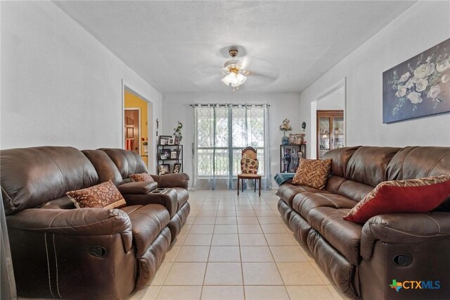2080 Allison Rd, Martindale, TX 78655 - living room featuring light tile patterned floors and a ceiling fan