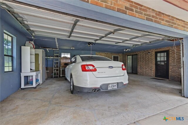 2080 Allison Rd, Martindale, TX 78655 - garage featuring a garage door opener