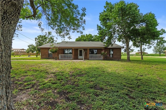 2080 Allison Rd, Martindale, TX 78655 - single story home featuring a front lawn and brick siding