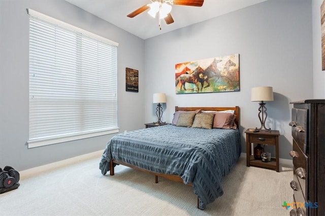 bedroom featuring ceiling fan and carpet floors