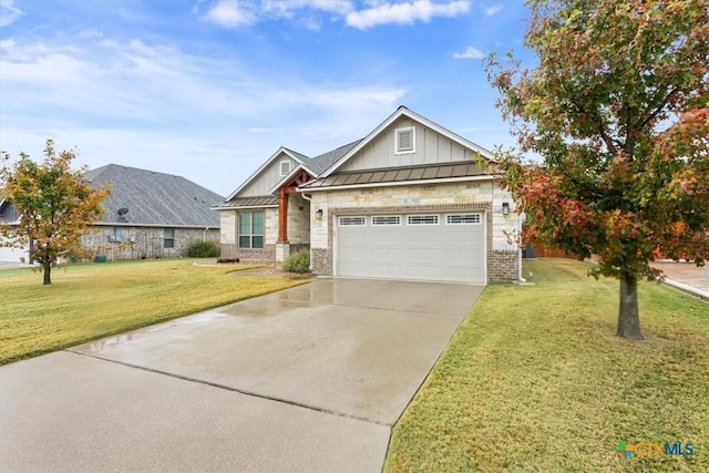 view of front of house with a front lawn and a garage