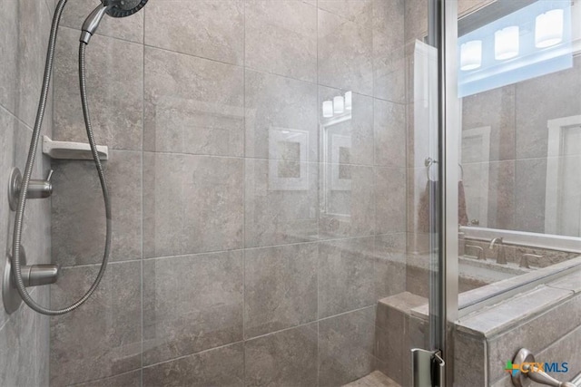 bathroom featuring an enclosed shower