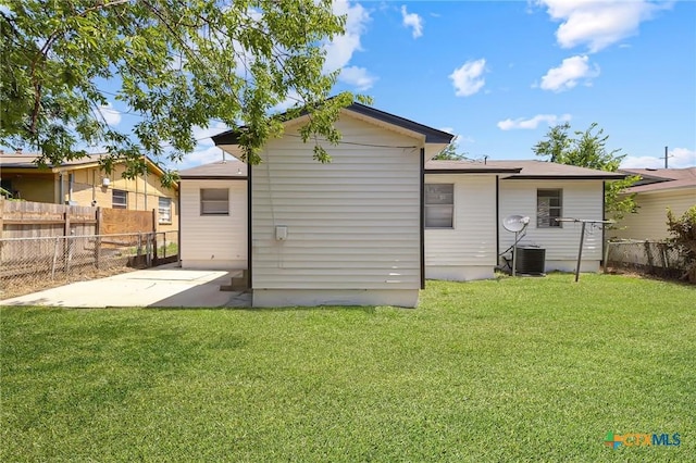 3102 Taft St, Killeen, TX 76543 - back of property featuring a patio and central AC