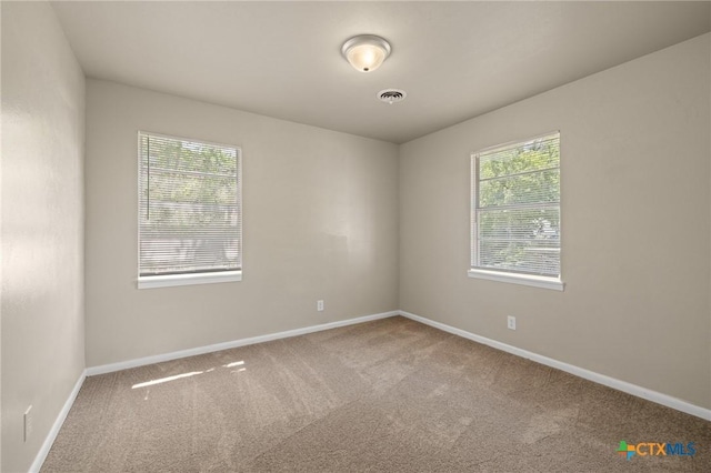 3102 Taft St, Killeen, TX 76543 - spare room featuring healthy amount of natural light, carpet floors, and baseboards