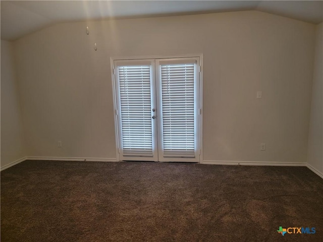 additional living space featuring carpet floors, baseboards, and vaulted ceiling