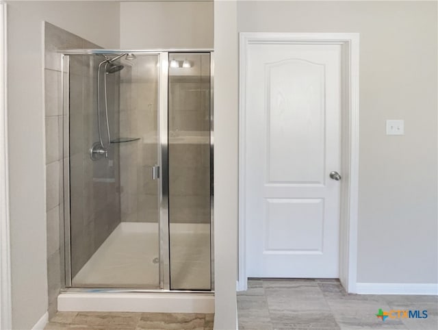 bathroom featuring walk in shower