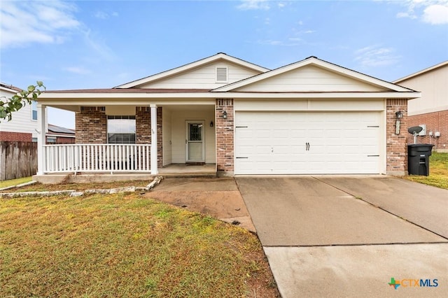 ranch-style home featuring an attached garage, covered porch, brick siding, driveway, and a front lawn