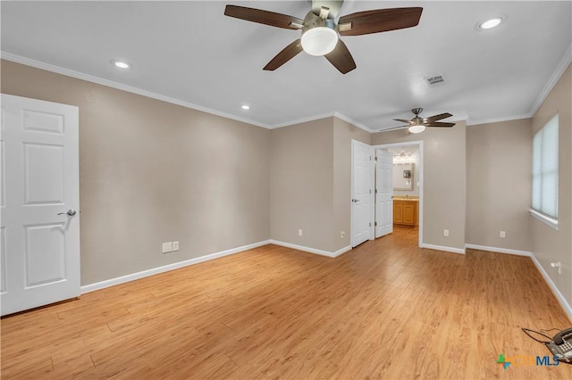 unfurnished room featuring baseboards, a ceiling fan, crown molding, and light wood finished floors