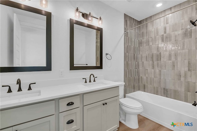 4018 Prairie Dr, Nolanville, TX 76559 - full bath with double vanity, shower / bath combination, and wood finished floors