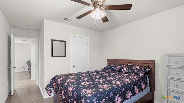 9741 Sandy Ridge Way, San Antonio, TX 78239 - bedroom featuring wood finished floors and a ceiling fan