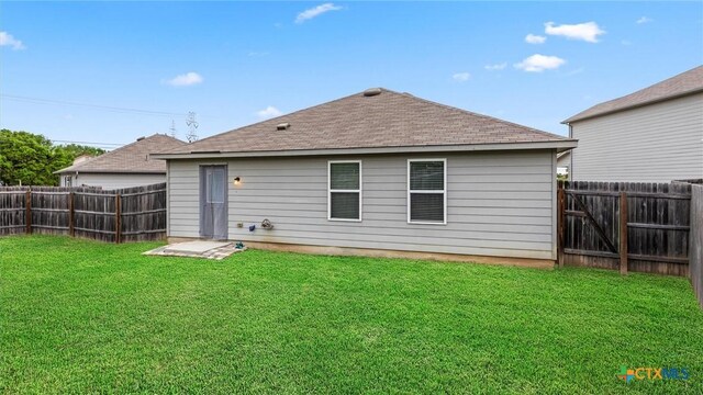 9741 Sandy Ridge Way, San Antonio, TX 78239 - rear view of house with a fenced backyard and roof with shingles