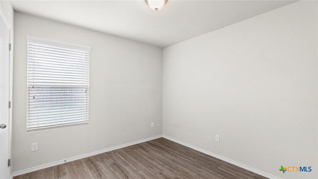 9741 Sandy Ridge Way, San Antonio, TX 78239 - empty room featuring wood finished floors and baseboards