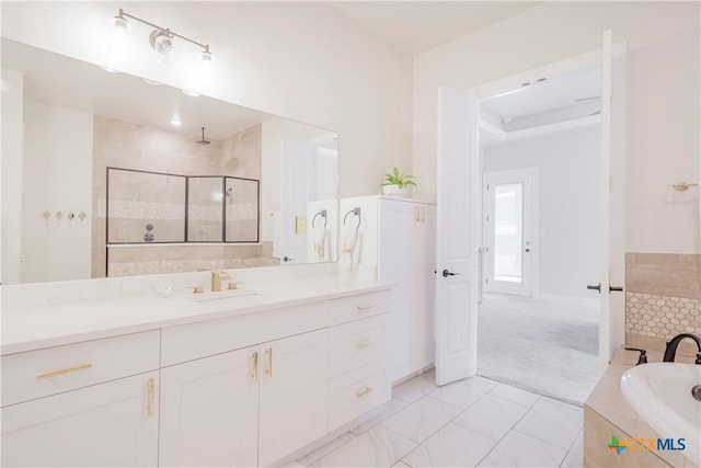 bathroom featuring tile patterned floors, vanity, and independent shower and bath