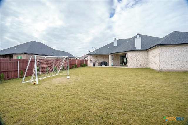 view of yard with a patio area