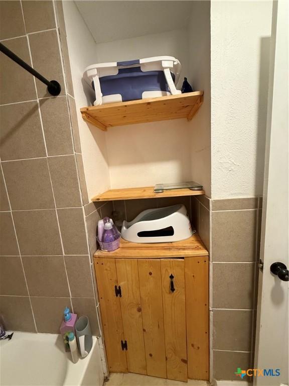 1403 Little St, Copperas Cove, TX 76522 - bathroom featuring a tub