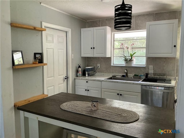 1403 Little St, Copperas Cove, TX 76522 - kitchen featuring dishwasher, a sink, white cabinets, a textured ceiling, and dark countertops