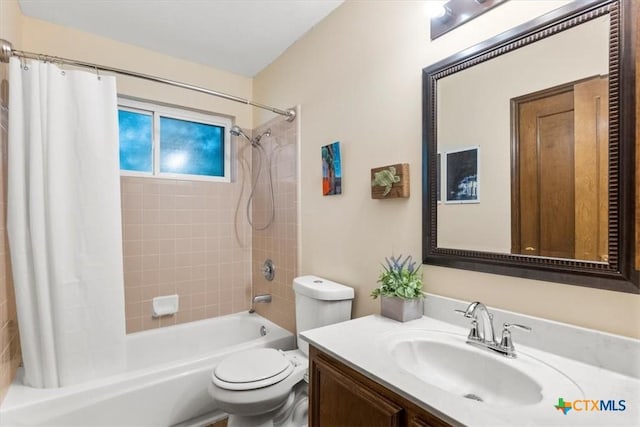 full bathroom featuring vanity, toilet, and shower / bath combo