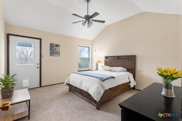 bedroom with light carpet, lofted ceiling, and ceiling fan