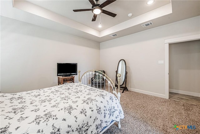 8508 Mount Nebo Cir, Belton, TX 76513 - carpeted bedroom featuring a raised ceiling, baseboards, recessed lighting, and ceiling fan