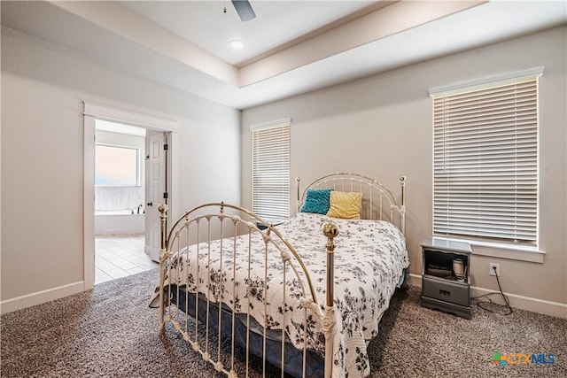 8508 Mount Nebo Cir, Belton, TX 76513 - carpeted bedroom with baseboards, ensuite bath, and ceiling fan