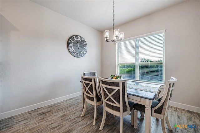 8508 Mount Nebo Cir, Belton, TX 76513 - dining area featuring baseboards, a chandelier, and wood finished floors