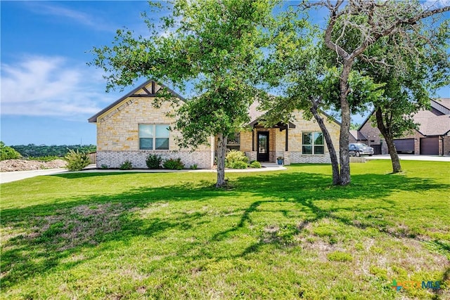 8508 Mount Nebo Cir, Belton, TX 76513 - view of front of property with a front yard, brick siding, and stone siding