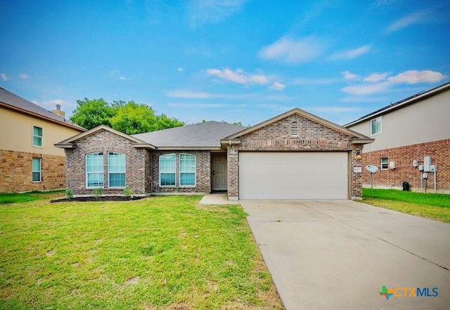 ranch-style home featuring a garage and a front lawn