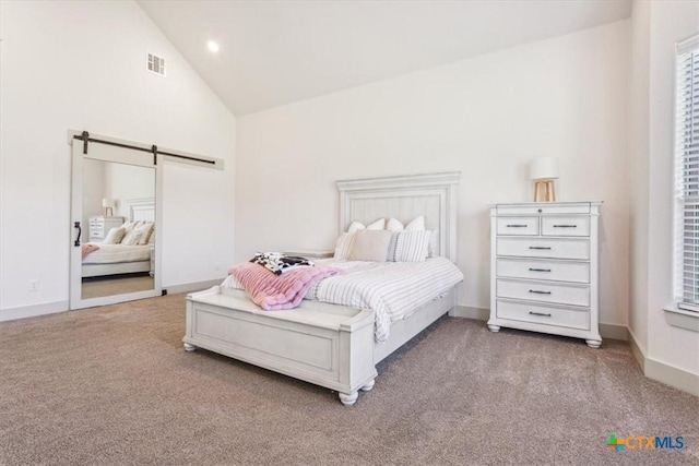 124 Cumberland Dr, Belton, TX 76513 - bedroom featuring high vaulted ceiling, a barn door, visible vents, and carpet