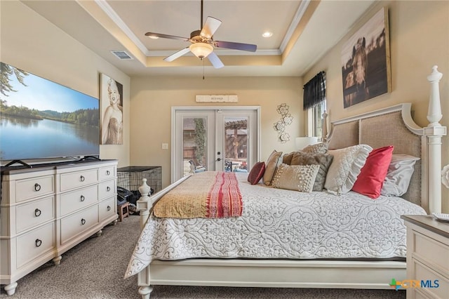 carpeted bedroom featuring french doors, a raised ceiling, crown molding, and access to outside