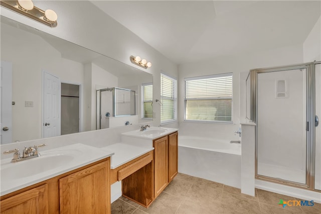 bathroom with separate shower and tub, tile patterned floors, and vanity