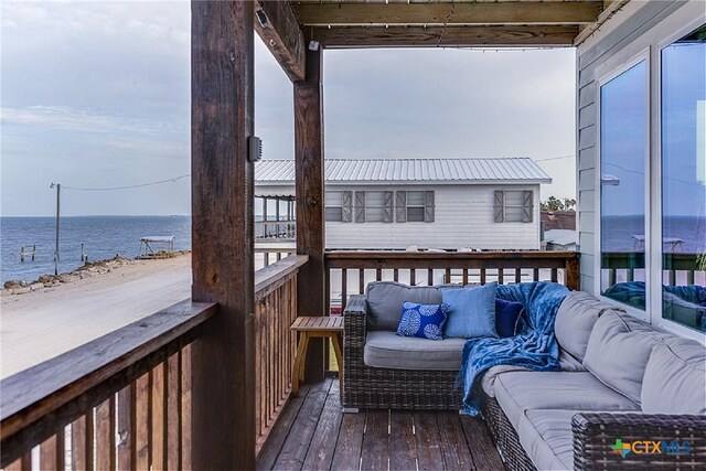1265 N Ocean Dr, Port Lavaca, TX 77979 - wooden deck with outdoor lounge area and a water view