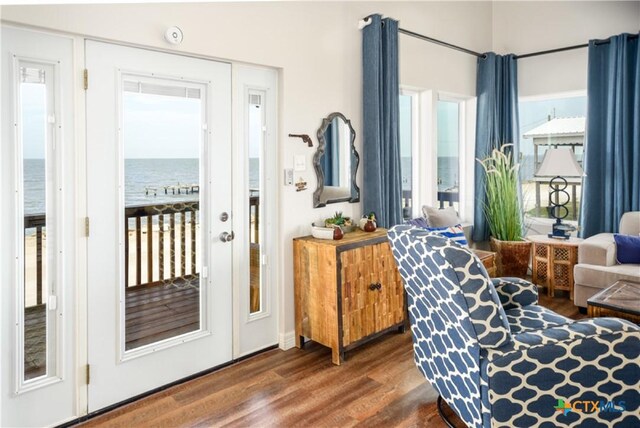 1265 N Ocean Dr, Port Lavaca, TX 77979 - interior space featuring dark wood-style floors and a water view