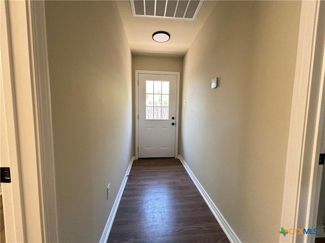 entryway with dark wood-type flooring