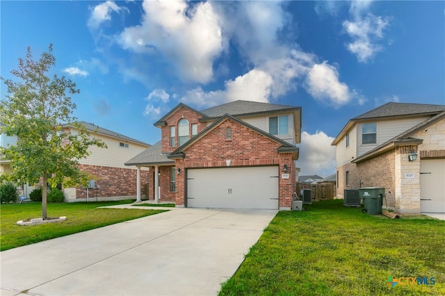 view of front property featuring a garage, central AC, and a front yard