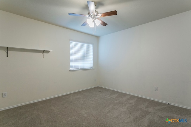 carpeted empty room with ceiling fan