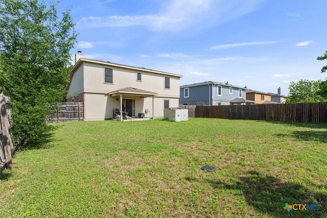 5407 Whistle Stop Dr, Temple, TX 76502 - rear view of property with a chimney
