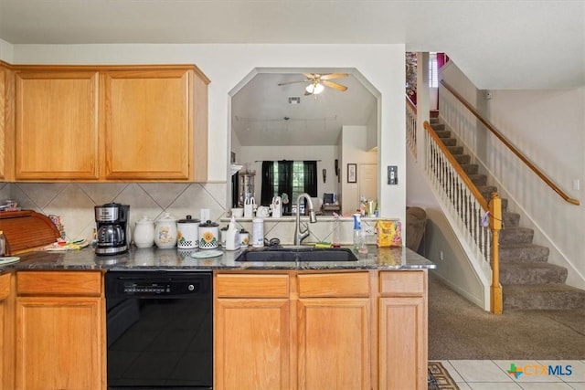 5407 Whistle Stop Dr, Temple, TX 76502 - kitchen featuring black dishwasher, a sink, ceiling fan, and decorative backsplash