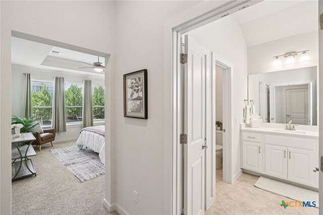 156 High Plains Dr, Georgetown, TX 78628 - bathroom featuring vanity, ceiling fan, and vaulted ceiling