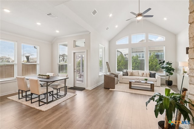 156 High Plains Dr, Georgetown, TX 78628 - dining space with wood finished floors, a ceiling fan, and high vaulted ceiling