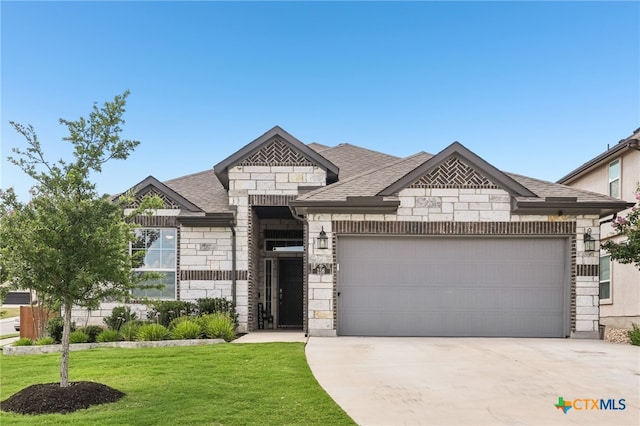 156 High Plains Dr, Georgetown, TX 78628 - french country inspired facade with stone siding, concrete driveway, an attached garage, and a front yard