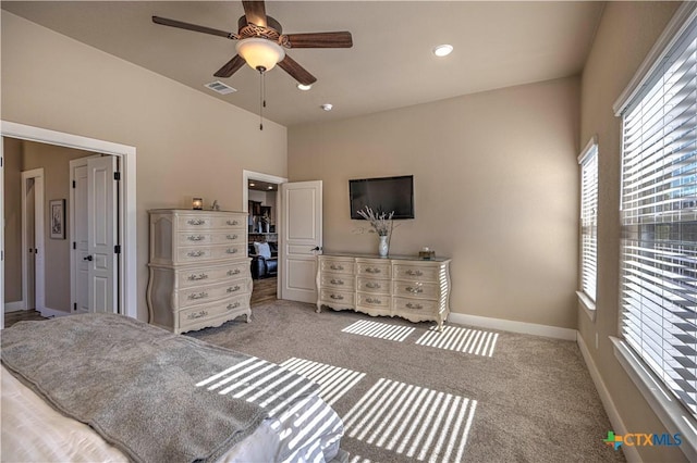 carpeted bedroom featuring ceiling fan